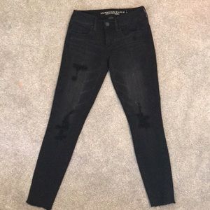 black american eagle jeans with rips